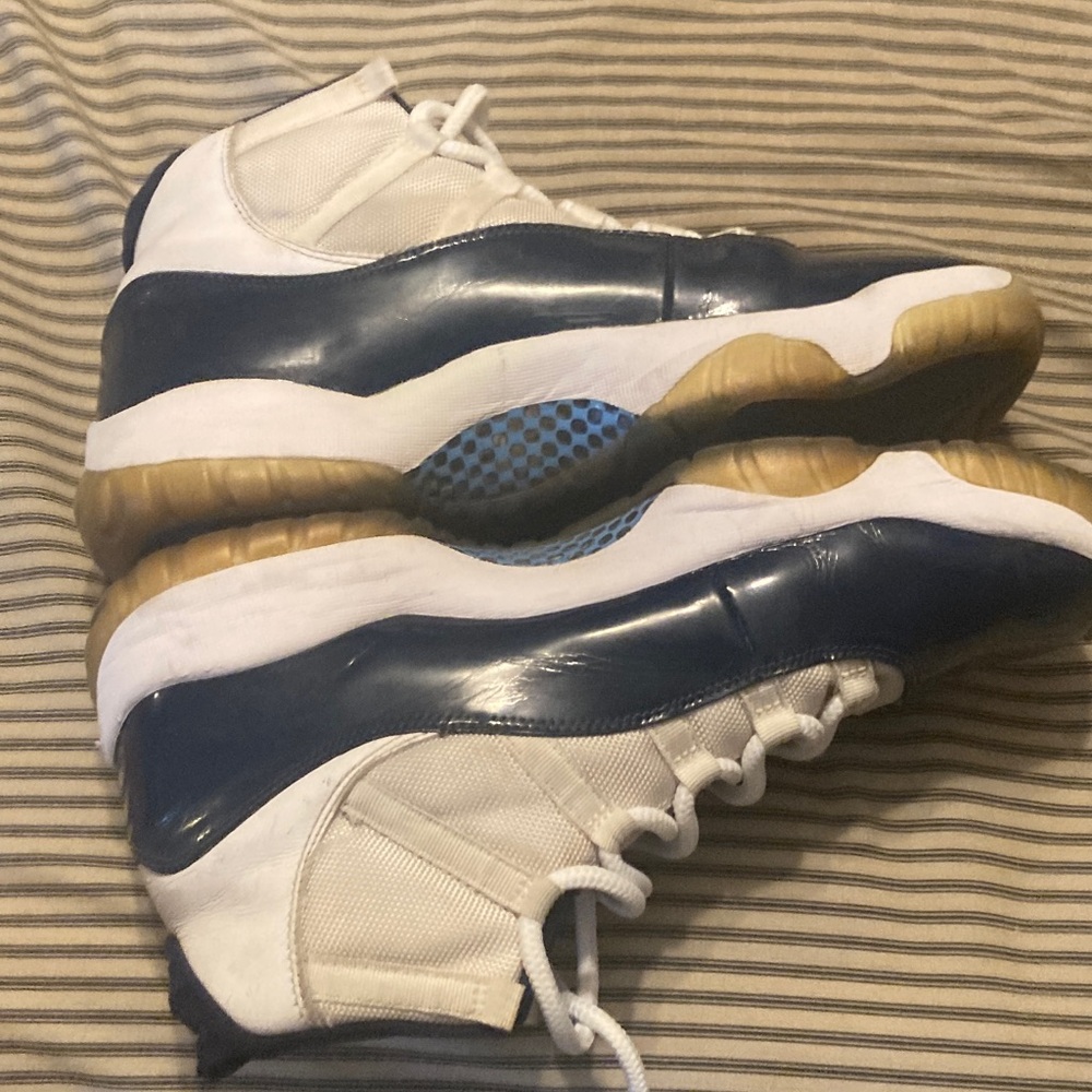 Jordan 11 White and Navy Sneakers. Win like 82